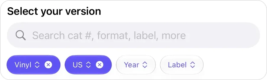 The Select your version header in VinylBox: a search field reading Search cat #, format, label, more, above the filter chips Vinyl and US, both switched on, then Year and Label