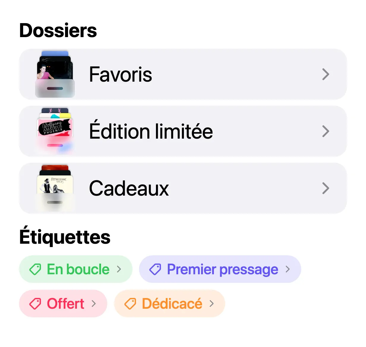 Trois dossiers dans VinylBox, Favoris, Édition limitée et Cadeaux, au-dessus des étiquettes En boucle, Premier pressage, Offert et Dédicacé
