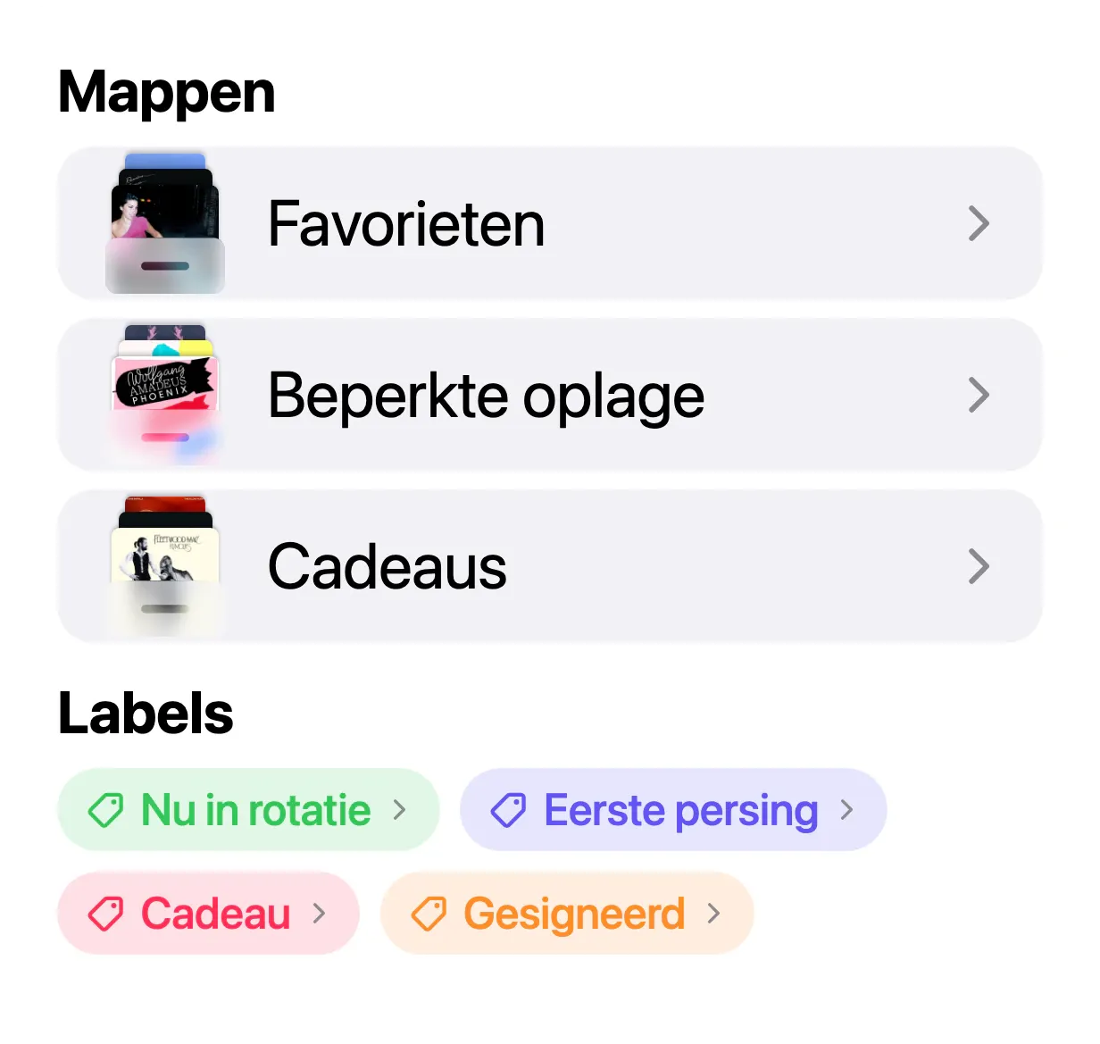 Drie mappen in VinylBox, “Favorieten”, “Beperkte oplage” en “Cadeaus”, boven de labels “Nu in rotatie”, “Eerste persing”, “Cadeau” en “Gesigneerd”